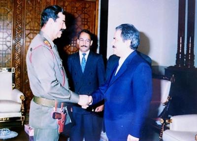 Саддам Хусейн встречается с лидером МЕК Масудом Раджави