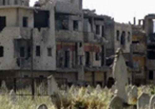 Поездка по некоторым районам Хомса напоминает путешествие по городу-призраку.